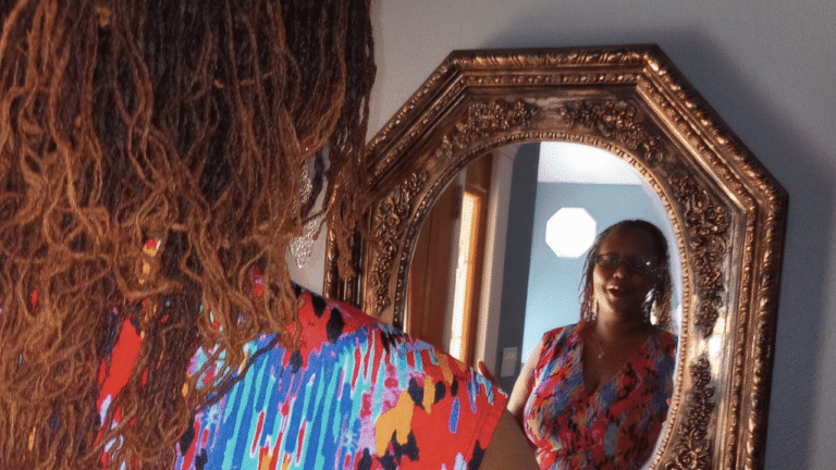 Christine looking in a mirror
